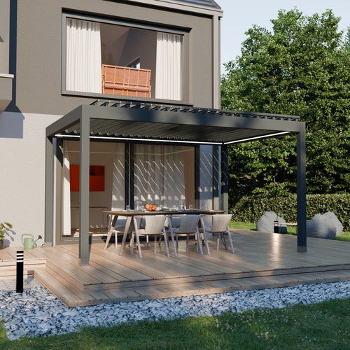 Louvered pergola attached to a modern house with outdoor furniture and plants.